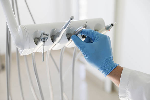 Professional Tooth Extraction technician working in Mansfield Center, CT